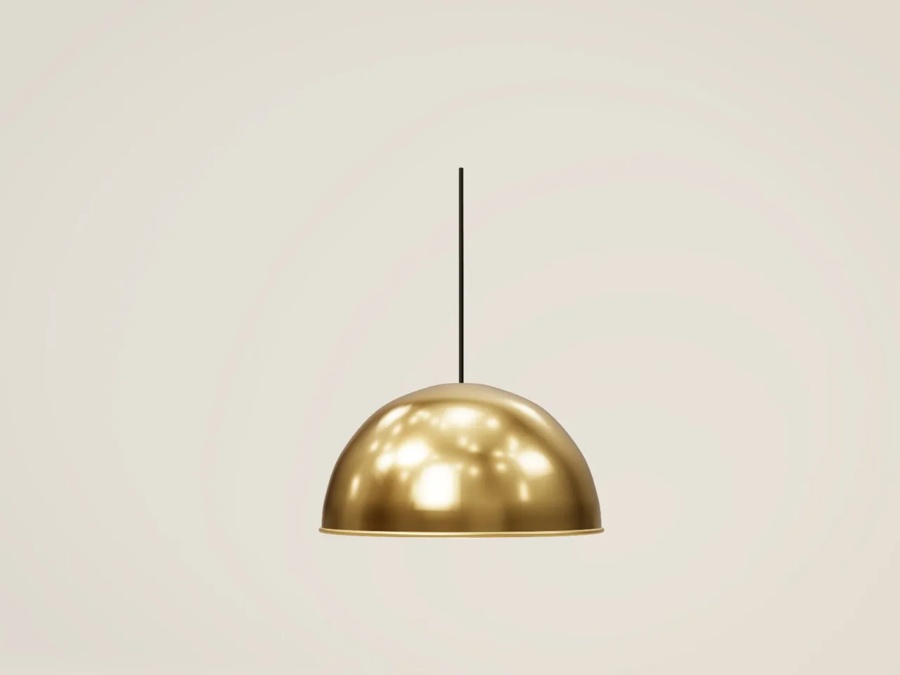 Brass dome pendant light with a warm glow