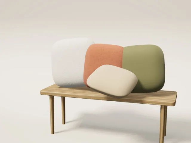 Set of four decorative cushions in boucle, linen and velvet on an oak bench