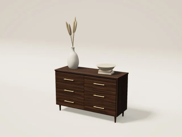 Walnut six-drawer dresser with brass handles, styled with a vase and books